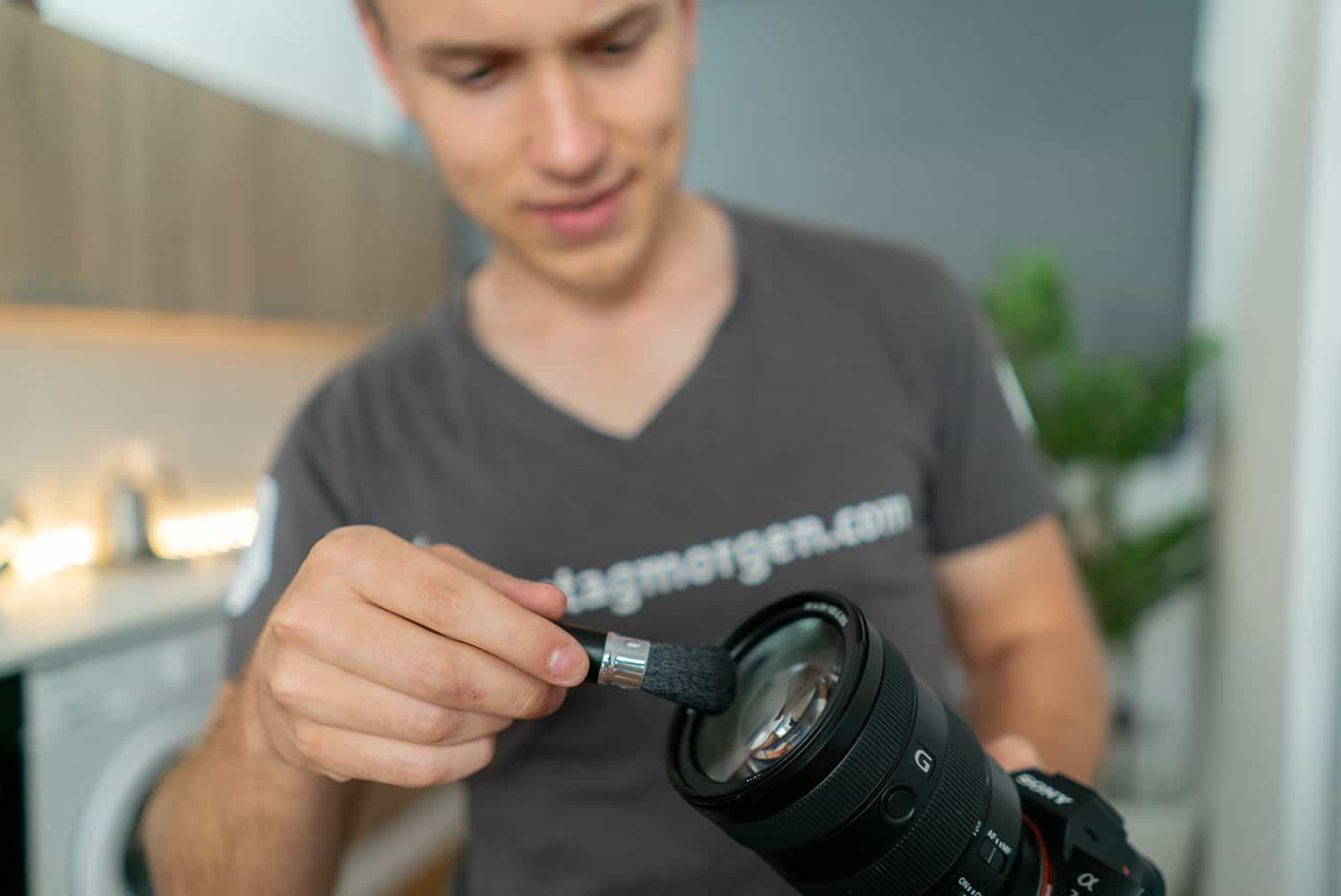 Objektivreinigung mit Pinsel